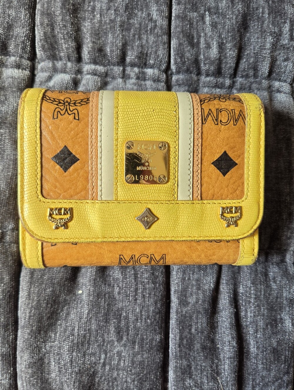MCM Yellow and Orange Logo Continental Wallet with Gold Plaque